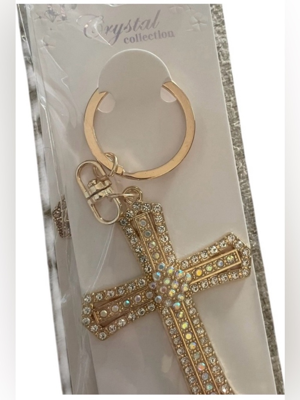 Bag Charm Cross metal featuring beautiful gold color rhinestone accents